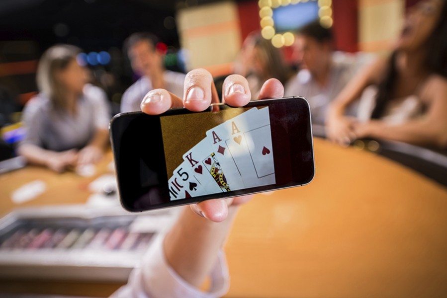 Playing cards online from a cell phone