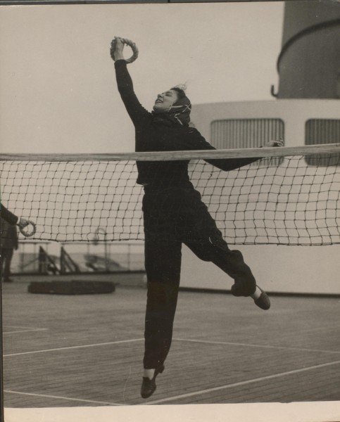 Woman playing tennis on a cruise ship