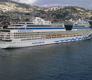 The Aida Sol with Funchal, Madeira in the background.