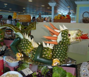 A pineapple and vegtable dragon in the buffett resturant one lunch time Ocean Princess