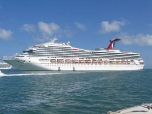 Approaching Carnival Glory anchored off Belize City