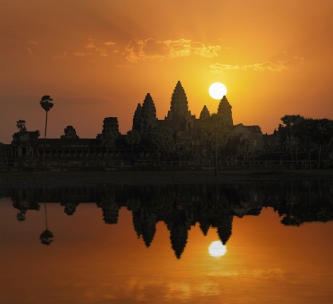 Cambodia landmark Angkor Wat with reflection in water on sunrise