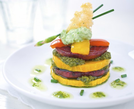 A delicious stack of beets and squash layered with pesto topped with minted pea butter.  Shallow dof