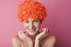 young woman with red curly hair