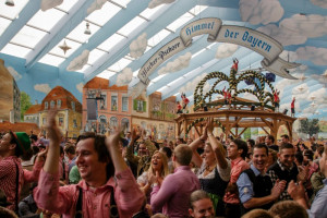 Inside the Hacker Festzelt (Himmel der Bayern) at Oktoberfest with its lovely decoration of the roof and the surrounding walls