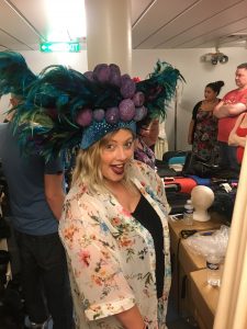 Dressing up in a head piece from one of the shows!!