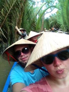 My Brother Robin and I on a Canoe on the Mekong (I was a little sunburnt)