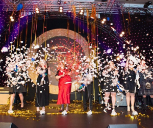 Our moment on stage for the Silversea Competition - Photo from Travel Weekly