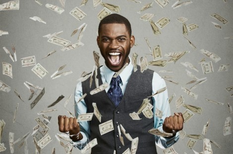 Closeup portrait happy successful student, business man winning, fists pumped celebrating success isolated grey wall background. Positive human emotion, facial expression. Life perception, achievement