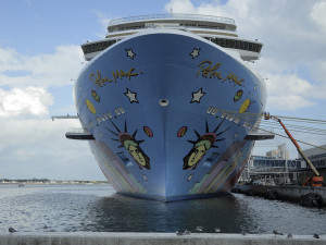 Port Canaveral, Florida, USA - November 10, 2015: The cruise ship Norwegian Breakaway at dock at Port Canaveral Terminal One. The bow is painted with the head of Miss Liberty and the New York City Skyline and is signed by artist Peter Max.