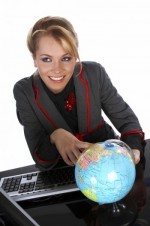 Lovely smiling pretty woman, travel agency officer showing destination on the globe