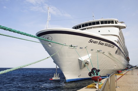 Owned by Regent Seven Seas Cruises, the 490 passenger Seven Seas Navigator docked at the pier in Cozumel, offer passengers large suites and balconies.