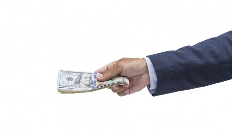 Businessman hand with money, United stage dollar bill; clipping path